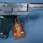 Sold - JAPANESE WW2 TYPE 94 PISTOL.... JUNE, 1944 PRODUCTION......WITH MATCHING MAG....MINT AND ROUGH!