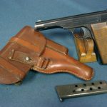 SOLD LUFTWAFFE ISSUE FN 1922 PISTOL........FULL RIG WITH DROPPING HOLSTER....MINT!