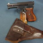 SOLD SCARCE MODEL 1910/34 MAUSER PISTOL....THE "BABY" MODEL 1934...6.35mm.... WITH RARE MARKED HOLSTER...MINT!