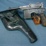 SOLD GERMAN NAVY MAUSER M1896/12 BROOMHANDLE WITH NAVY HOLSTER.......PISTOL PICTURED ON P156 AXIS PISTOLS.......ULTRA RARE HUGE DEAL!
