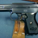Sold - VERY SCARCE MODEL 1910/34 MAUSER PISTOL....THE "BABY" MODEL 1934...6.35mm .... WITH RARE BLACK PLASTIC BANNER GRIP...MINT!