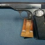 sold SCARCE FN MODEL 1922 PISTOL......NAZI COMMERCIAL "EAGLE N" MARKED.........MINT CRISP!
