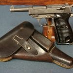 SOLD SCARCE byf 44 P.38 PISTOL........ALL PHOSPHATE.....NAZI "GRAY GHOST".........FULL RIG.....SHARP!