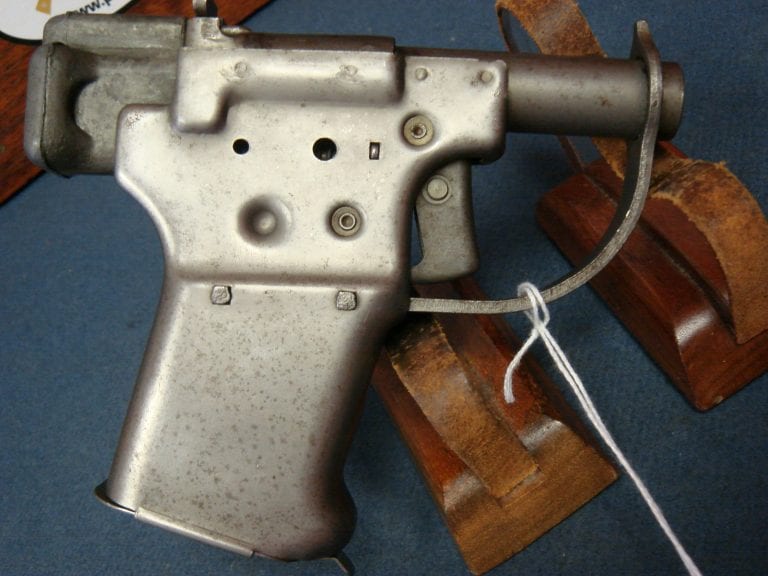 SOLD US WW2 OSS LIBERATOR PISTOL........RARE TYPE 3.... 4 HOLE VARIANT ...