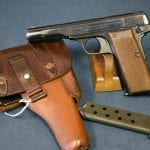 SOLD EXCEPTIONAL LUFTWAFFE ISSUE FN 1922 PISTOL........FULL RIG WITH DROPPING HOLSTER....MINT CRISP!