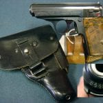 SOLD  IMPORTANT SS ISSUE WALTHER PPK.......VERY EARLY TYPE 2 MUZZLE NUMBERED........THEUERMANN DROPPING HOLSTER......IN BOOK!!!