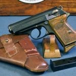 SOLD EARLY PRODUCTION WALTHER PPK PISTOL......CROWN N COMMERCIAL WITH 90 DEGREE SAFETY........FULL RIG.....VERY SHARP!