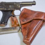 SOLD  WED 12-18 VERY SCARCE JAPANESE TYPE 94 NAMBU PISTOL, 13.11 DATE (NOV, 1938) EARLY PRODUCTION, 2 MATCHING MAG RIG, VERY SHARP!