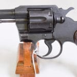 SOLD US WW2 COLT COMMANDO .38 SPEC. REVOLVER UN-ISSUED….NEW CONDITION STILL IN STORAGE GREASE…..ALABAMA NATIONAL GUARD GUN