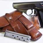 SOLD  EXCEPTIONAL MAUSER HSc PISTOL, 1943 GERMAN ARMY ISSUE E/135 WITH RARE PLASTIC GRIPS, RARE MAKER HOLSTER,KILLER MINT RIG!