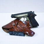 Sold  EXCEPTIONAL WALTHER PP PISTOL, 1944 WAFFENAMTED, MILITARY FINISH, RARE BROWN GRIPS, cny44 tan holster, FULL RIG, MINT CRISP!