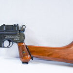 SOLD  OUTSTANDING ASTRA MODEL 900 PISTOL, CHINESE CONTRACT MARKED, MINT NEW, WITH ORIGINAL MATCHING STOCK, STUNNING!