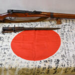 SOLD, JAPANESE WWII TYPE 99 RIFLE, VERY EARLY PRODUCTION TOYO KOGYO 3OTH SERIES, ALL MATCHING DOWN TO THE DUST COVER, WITH BAYONET & BATTLE FLAG, ALL VET BROUGHT BACK TOGETHER!