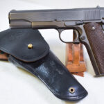 SOLD  US WWII - VIETNAM REMINGTON RAND M1911A1 US ARMY SERVICE PISTOL, WITH POST WW2 BLACK DYED HOLSTER, NICE!