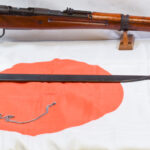 SOLD JAPANESE WWII TYPE 99 RIFLE, LATE MIDWAR PRODUCTION TOYO KOGYO 33rd SERIES, ALL MATCHING WITH BAYONET, FLAG & OCCUPATION BRINGBACK PAPERS