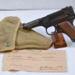 SOLD  GRISLY JAPANESE OKINAWA SUICIDE USED NAMBU TYPE 94 PISTOL, MARCH, 1945 LATE WAR SQUAREBACK, 1 MATCHED MAG AND HOLSTER & CAPTURE PAPERS TOO!