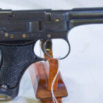 SOLD WED MAY 19, VERY SCARCE EARLY JAPANESE TYPE 94 NAMBU PISTOL, 12.10 DATE (OCT, 1937), MATCHING MAG, MINT CRISP!