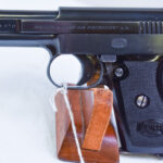 SOLD  VERY SCARCE MODEL 1910/34 MAUSER PISTOL, THE “BABY” MODEL 1934, 6.35mm (.25 AUTO),  WITH RARE BLACK PLASTIC BANNER GRIP, MINT CRISP!