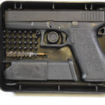 SOLD VERY EARLY 1987 GLOCK 17 PISTOL, EARLY GEN 1, RARE ADJUSTABLE SIGHT, WITH RARE EARLY TUPPERWARE BOX, MINT CRISP!