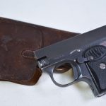 SOLD, VERY SCARCE FRITZ MANN MODEL 1921 VEST POCKET PISTOL, .25 AUTO, WITH ORIGINAL MARKED LEATHER HOLSTER!