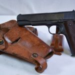 SOLD, IMPORTANT, APRIL,1943 INITIAL 1st MONTHS PRODUCTION ITHACA 1911A1 U.S. ARMY SERVICE PISTOL, DULITE FINISH & EARLIEST FEATURES, WITH M3 HOLSTER, NICE!