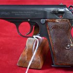 SOLD, RARE, 1944 PRODUCTION WALTHER PP PISTOL IN .22LR, HIGH GRADE FINISH, RARE RED GRIPS, MINT CRISP & STUNNING!
