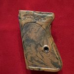 FRI JAN 7, ORIGINAL WARTIME WALTHER PPK GRIP BEAUTIFUL COLORING