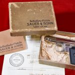 SOLD WED JAN 12, VERY SCARCE, FACTORY NICKLED SAUER MODEL 1913 PISTOL, WITH ORIGINAL BOX & MANUAL & WWII BRINGBACK PAPERS, MINT!