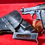 SOLD EXCEPTIONAL EARLY 1944 NAZI ISSUE MODEL 1935 BERETTA PISTOL, “4UT” MARKED EARLY HIGH POLISH VARIANT, FULL RIG!