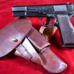 SOLD THU OCT 27, NAZI OCCUPATION BROWNING/FN HIGH POWER PISTOL, FIXED SIGHT, “a” BLOCK MID 1943 PRODUCTION, WITH RARE nka43 CODE HOLSTER, VERY SHARP!