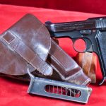 SOLD  EXCEPTIONAL 1939 ITALIAN AIRFORCE MARKED BERETTA MODEL 1935 PISTOL, STUNNING MINT CRISP FULL RIG!