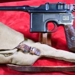SOLD  EXCEPTIONAL JAPANESE WWII ISSUED MAUSER MODEL 1930 BROOMHANDLE WITH IT'S ORIGINAL ULTRA RARE JAPANESE HOLSTER, MINT CRISP STUNNING!