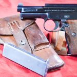 SOLD ULTRA RARE NAZI POLICE “EAGLE/C” MARKED MAUSER MODEL 1934 PISTOL, THE RAREST NAZI POLICE PISTOL, MINT FULL RIG WITH 2 MATCHING NUMBERED MAGS!
