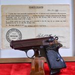 SOLD, EXTREMELY RARE LATE WAR, 1944 WALTHER PPK PISTOL, DURAL FRAME VARIANT, STILL WITH THE CAPTURE PAPERS & MINT SHARP!