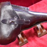 VERY SCARCE BROWN HARDSHELL HOLSTER FOR THE SWEDISH WALTHER HP PISTOL, RETAILER MARKED WILFORS, MINT CRISP!