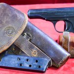 SOLD,  SCARCE WWII JAPANESE ARMY OFFICER’S FN MODEL 1910 PISTOL, FULLY RIGGED OUT  WITH FANTASTIC JAPANESE HOLSTER, VERY SHARP RIG!