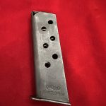 SOLD…NOV 27, ORIGINAL WWll WALTHER PPK MAGAZINE, PHOSPHATE WITH WALTHER BANNER STAMP 7.65 mm