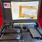 TUE JUL 30, RUGER SR40 PISTOL WITH CASE.