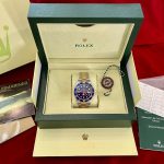 SOLD FRI JUNE 21, ROLEX SUBMARINER BLUESY IN 18K GOLD & STAINLESS WITH 18k YELLOW GOLD OYSTER BAND WITH GOLD THRU FLIPLOCK CLASP, REF #16613T (2006)