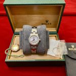 SOLD LADIES ROLEX OYSTER PERPETUAL WITH A FABULOUS DIAMOND BEZEL .70TW IN 18K WHITE GOLD!