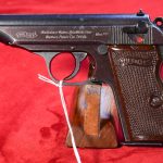 SOLD VERY CHOICE & ATTRACTIVE, 1944 WALTHER PP, WARTIME COMMERCIAL VARIANT WITH PLUM FRAME & SLIDE AND RARE RED GRIPS, REALLY POPS!