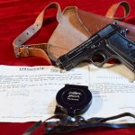 SOLD THU MAY 29, EXTREMELY RARE, 1942 ITALIAN AIRFORCE MARKED, MODEL 1934 BERETTA PISTOL, WITH DOUBLE CAPTURE PAPERS, SHOULDER HOLSTER & GERMAN COMPASS, MINT CRISP STUNNING RIG!