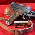 SOLD JAPANESE WWII TYPE 14 NAMBU PISTOL, 19.7 DATE (JULY, 1944) MATCHING MAG, MINT SHARP, WITH AMMO & HOLSTER NAMED TO LT. KOYAMA!