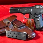 SOLD EXCEPTIONAL FN MODEL 1900 PISTOL, VERY EARLY 1901 PRODUCTION, WIDELY USED IN WWI, WITH SCARCE DANISH POLICE HOLSTER, STUNNING FULL RIG!