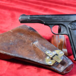 WED AUG 26, VERY CHOICE DUTCH ARMY PISTOOL M25 No.2 (FN MODEL 1922), WITH MATCHING # HOLSTER & ROD